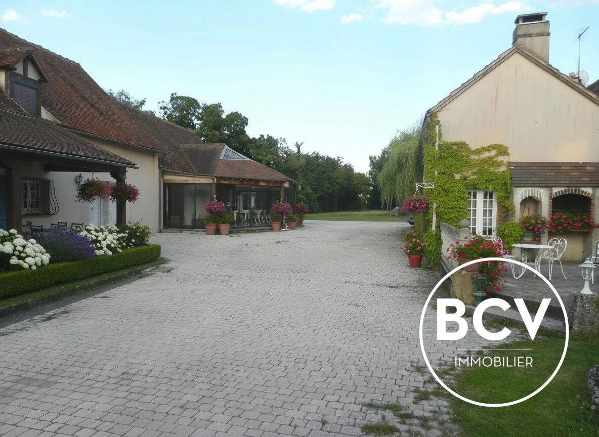 Maison T7 286m² + espace piscine intérieur + dépendance