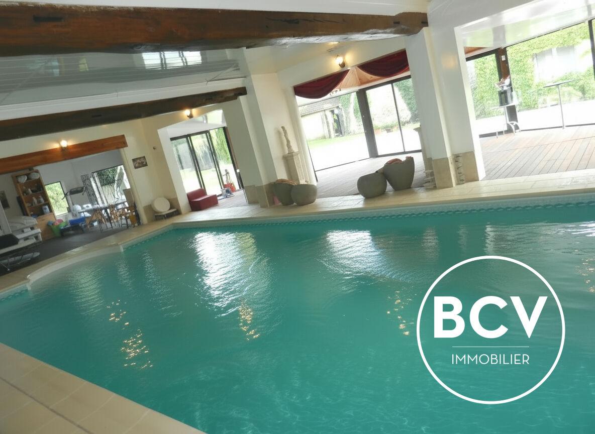 Maison T7 286m² + espace piscine intérieur + dépendance