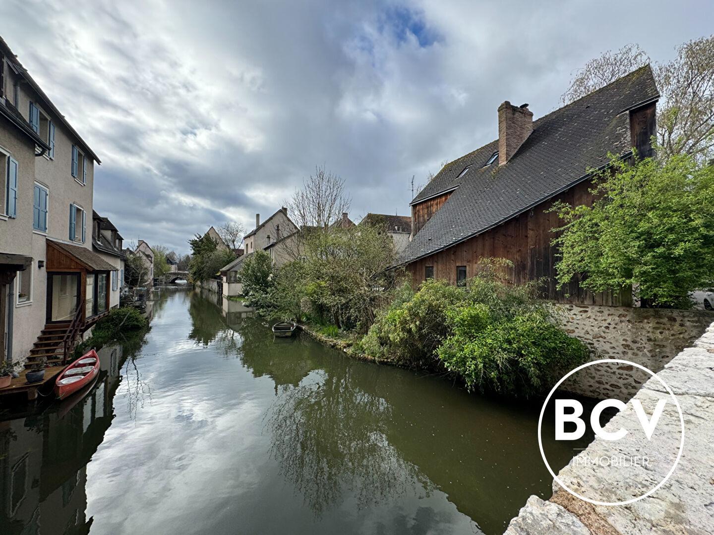 Appartement en Duplex + stationnement + cave