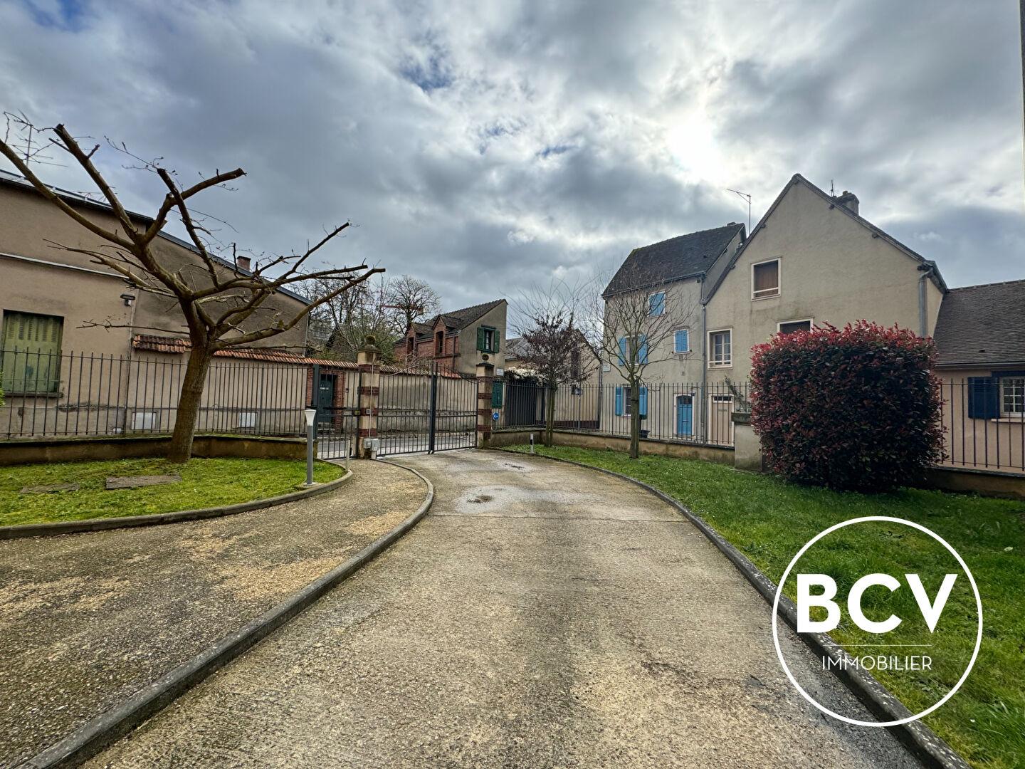 Appartement en Duplex + stationnement + cave