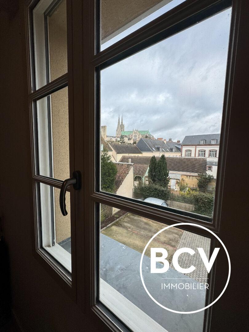 Appartement en Duplex + stationnement + cave