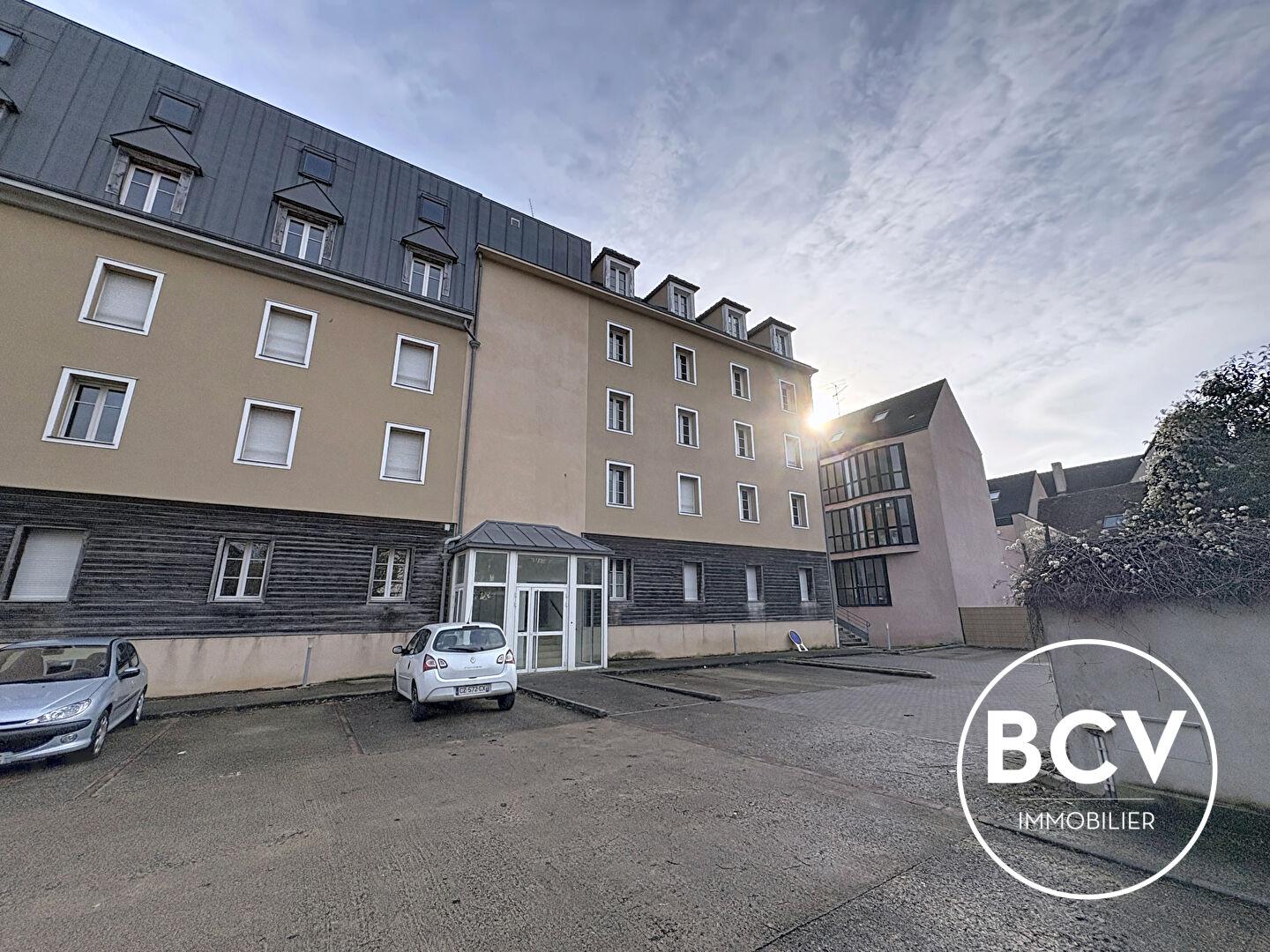 Appartement en Duplex + stationnement + cave